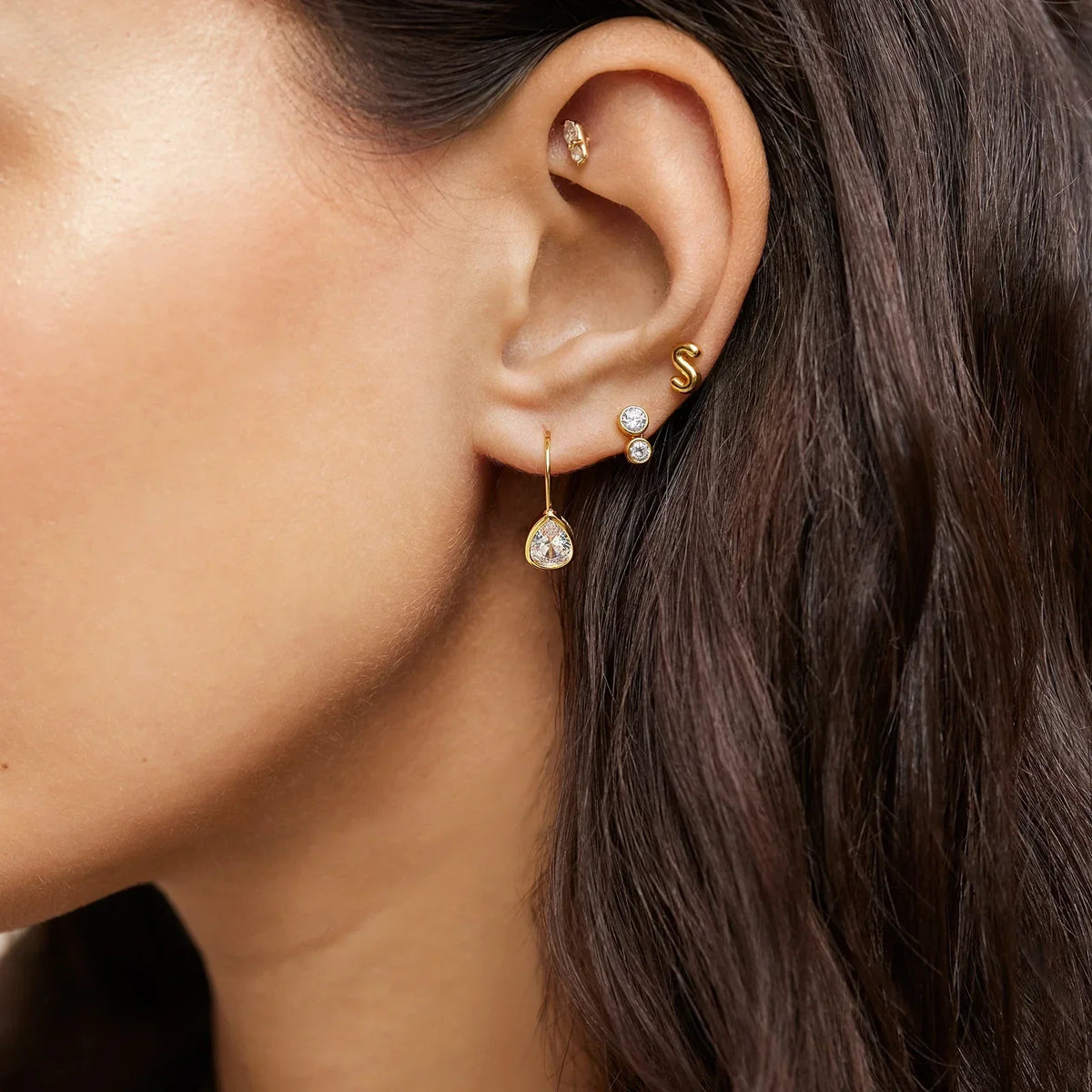 Lavisa - 14K Gold Shimmering Pavé Cubic Zirconia Stud Earrings - Detail & Styling View