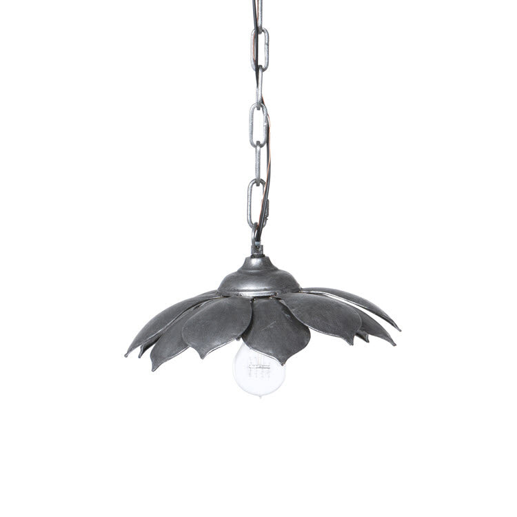 Lavisa floral pendant light fixture with handmade iron petals casting shadows