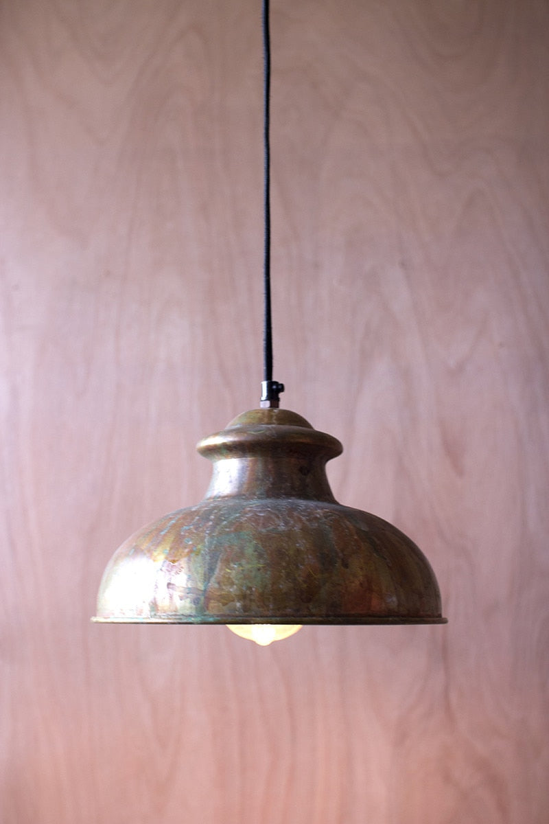 Lavisa Antique Rustic Pendant Light with distressed finish hanging over a counter
