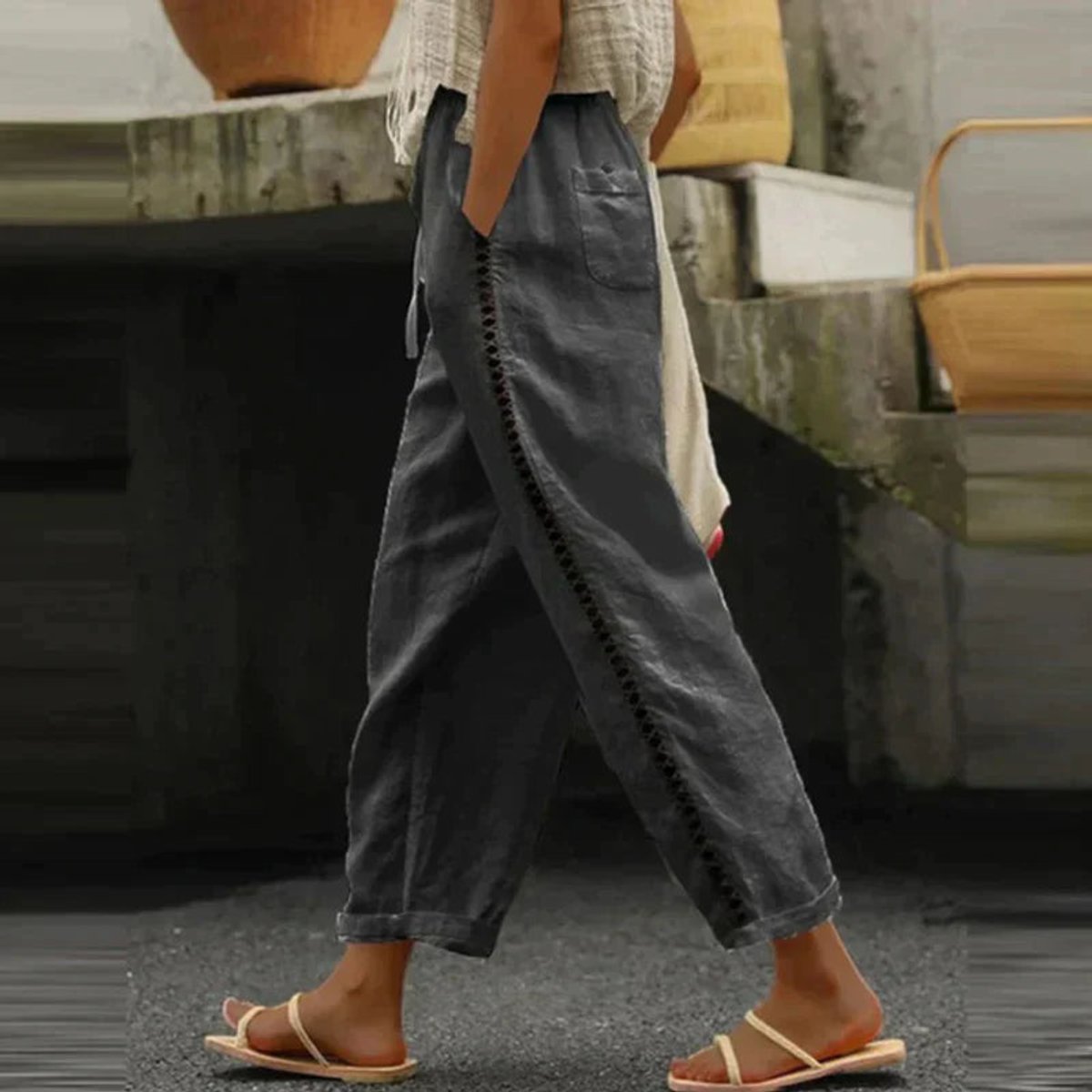 Women's High-Waist Tapered Linen-Look Button-Detail Trousers - Close-Up Texture & Detail | Lavisa