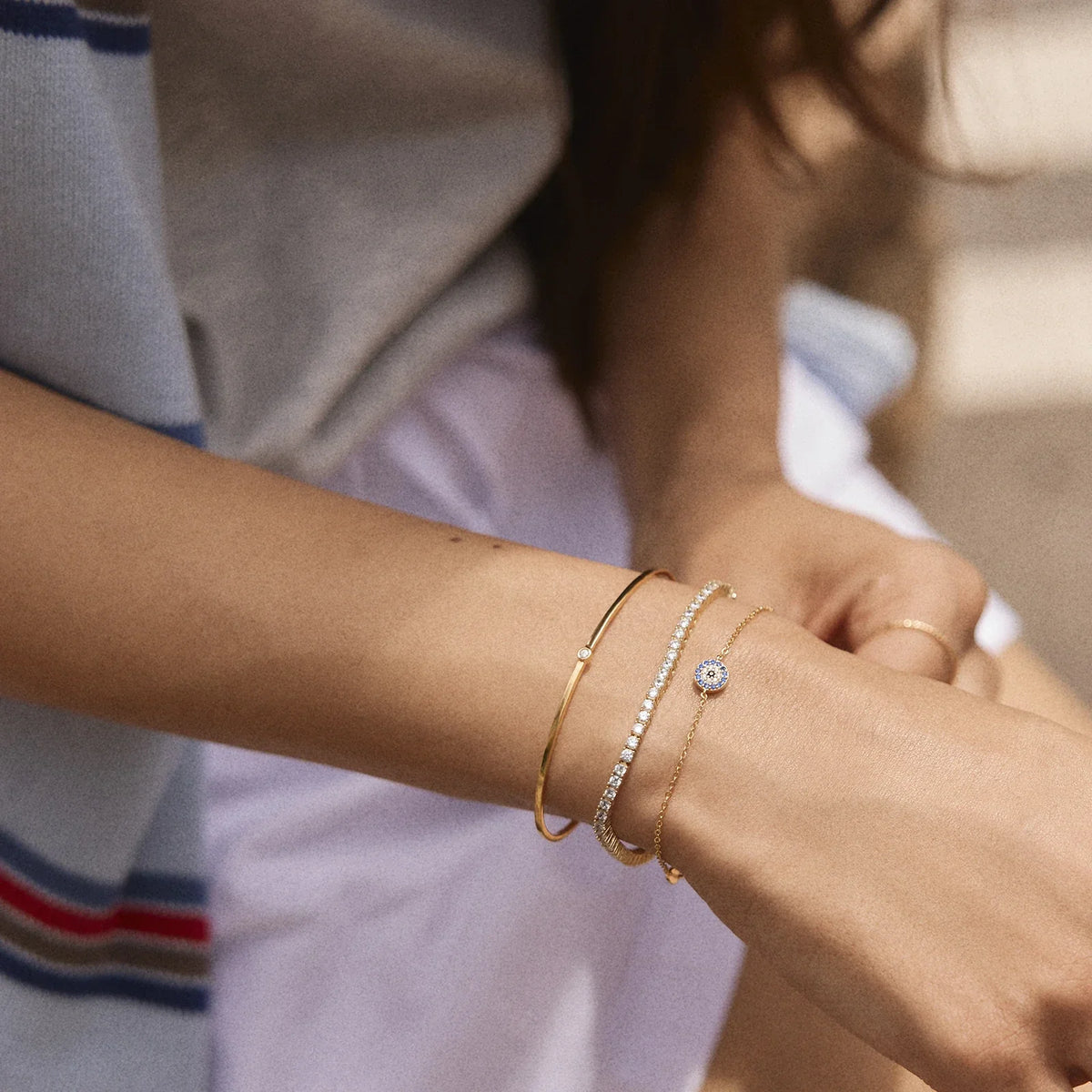 Lavisa - 18K Gold Evil Eye Chain Bracelet With Pavé Stones - Detail & Styling View