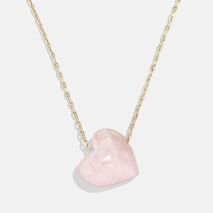 Lavisa Rose Quartz Heart Necklace featuring a natural pink crystal heart pendant on a gold chain