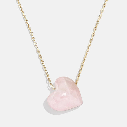 Lavisa Rose Quartz Heart Necklace featuring a natural pink crystal heart pendant on a gold chain
