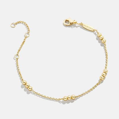 Lavisa 14K Gold Beaded Bracelet featuring delicate gold beads on a fine chain.