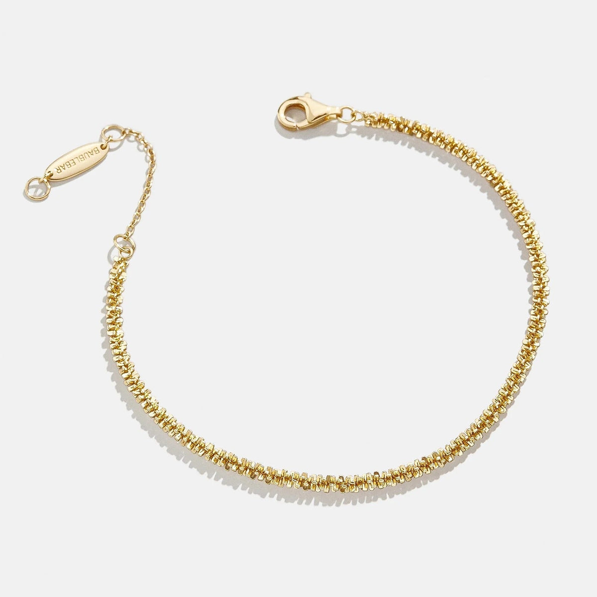 Lavisa minimalist gold chain bracelet resting on a clean white background