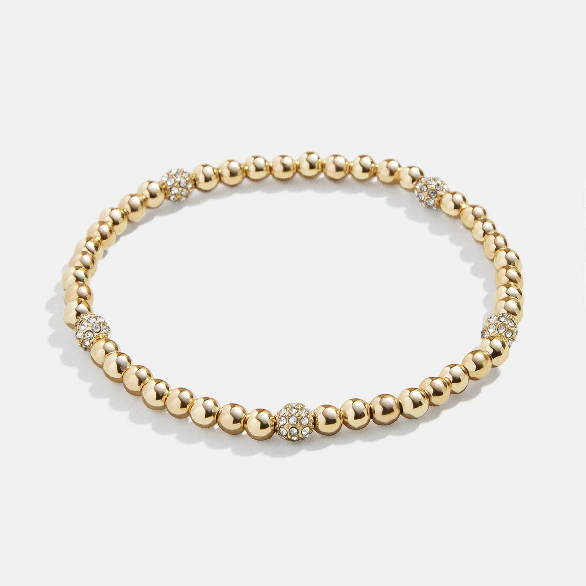 Lavisa Gold Beaded Pavé Sphere Stretch Bracelet featuring mixed gold beads and sparkling accents.