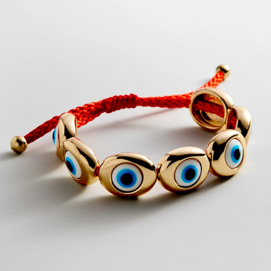 Lavisa gold and blue evil eye beaded bracelet with adjustable pull-tie closure