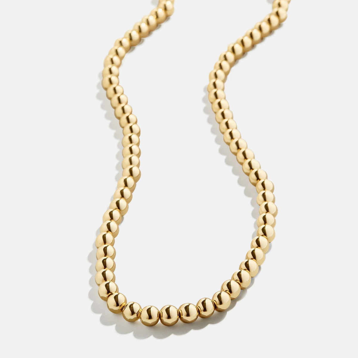 Lavisa Beaded Statement Necklace in gold tone designed for stylish layering