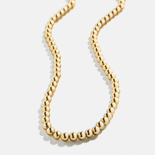 Lavisa Beaded Statement Necklace in gold tone designed for stylish layering