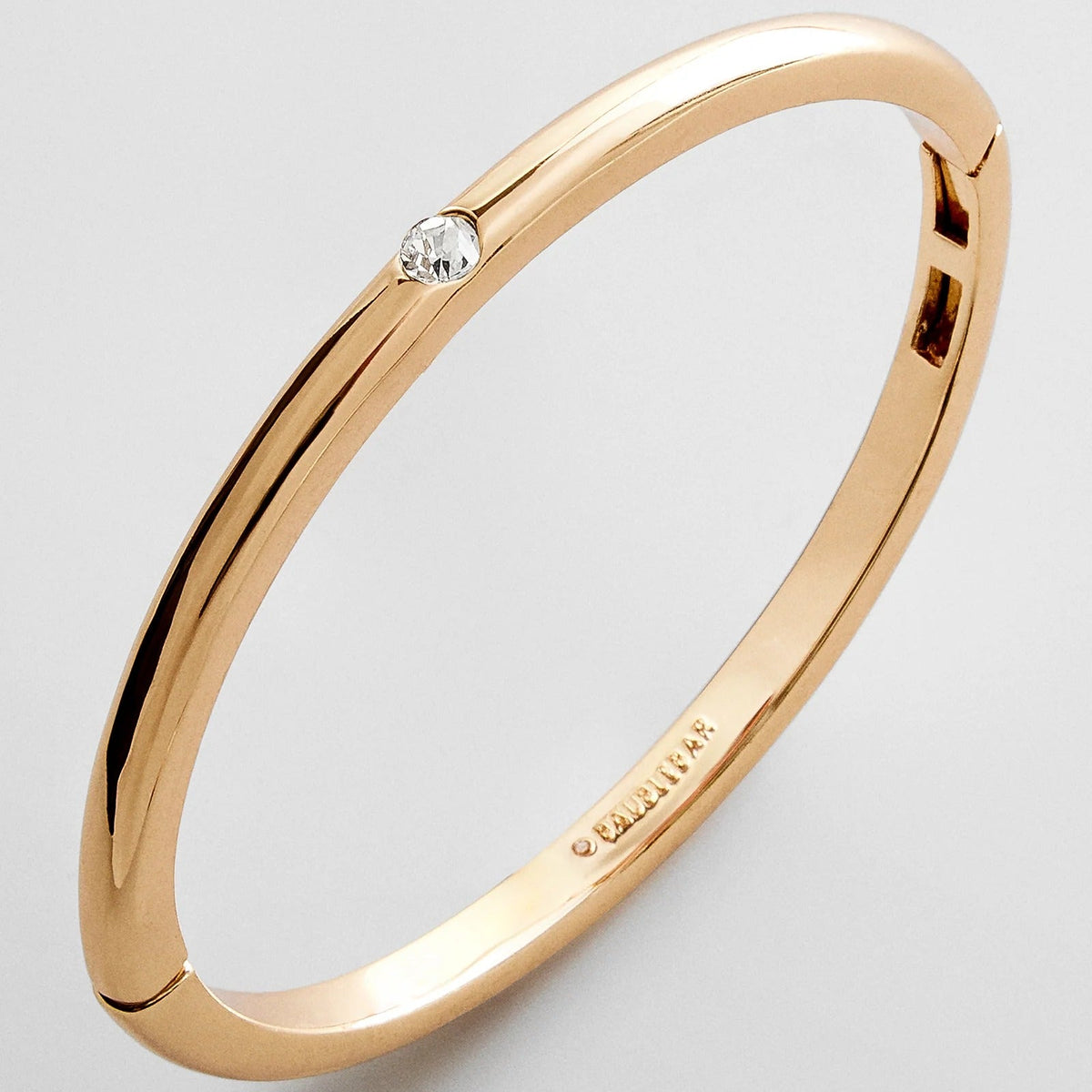 Lavisa classic single bezel hinge bangle in sleek metallic finish
