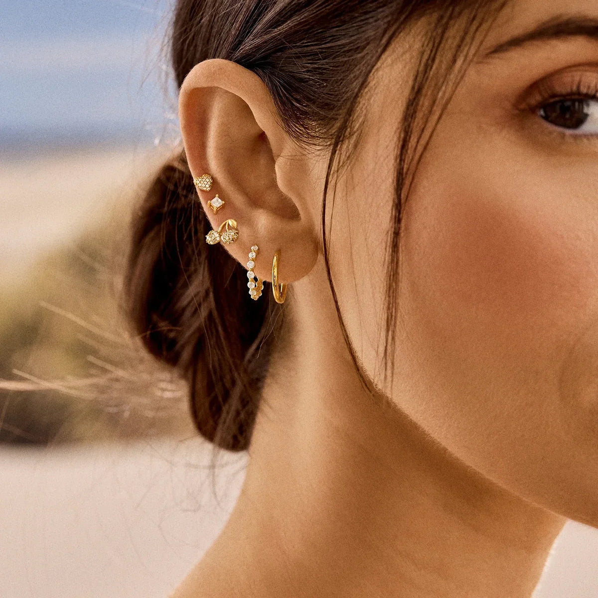 Lavisa - Pavé Cherry Gold Novelty Stud Earrings - Detail & Styling View