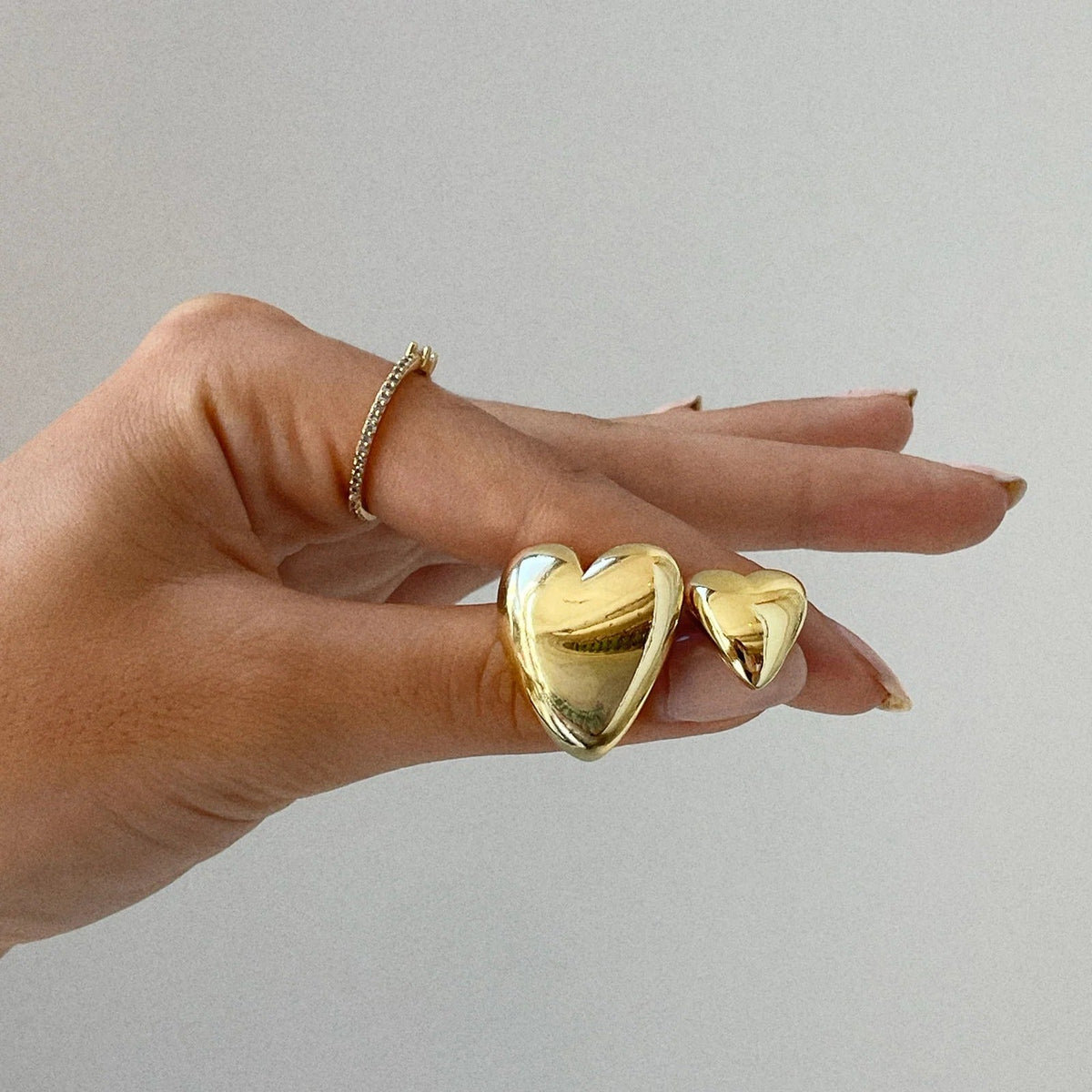 Lavisa - Gold Heart Huggie Hoop Earrings - On-Model & Scale View