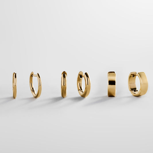 Lavisa waterproof gold huggie earring set displayed on a clean surface