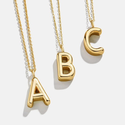 Lavisa Classic Gold Initial Necklace featuring a polished letter pendant on an adjustable gold chain
