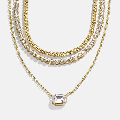 Lavisa Multi Strand Layered Necklace featuring gold chains and delicate sparkling stones