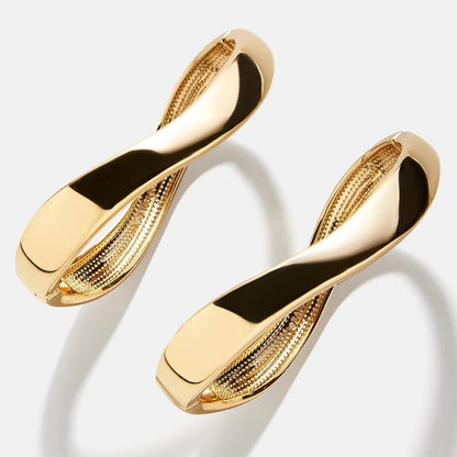 Lavisa Wavy Hinge Bangle Bracelet Set in polished gold with a modern silhouette.