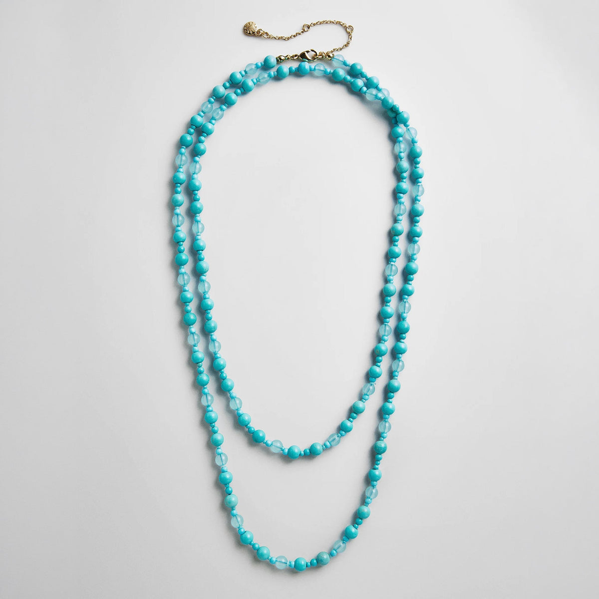 Lavisa Charlotte semi-precious necklace featuring bright turquoise beads.