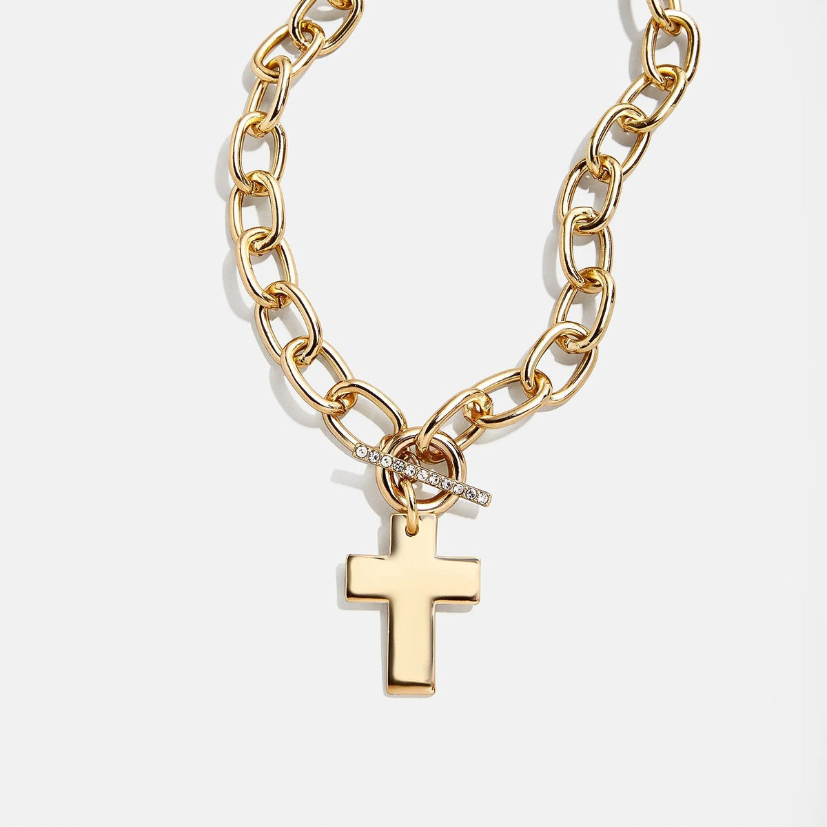 Lavisa statement cross necklace featuring a chunky chain and puffy cross pendant