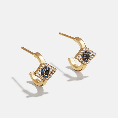 Lavisa 18K gold evil eye huggie hoop earrings with cubic zirconia stones