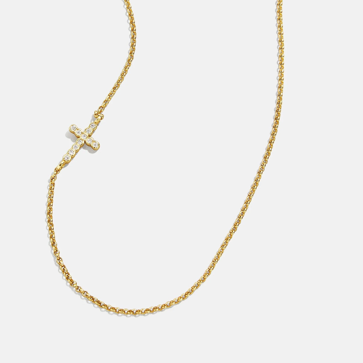 Lavisa - Asymmetrical Cubic Zirconia Cross Necklace In 18K Gold - On-Model & Scale View