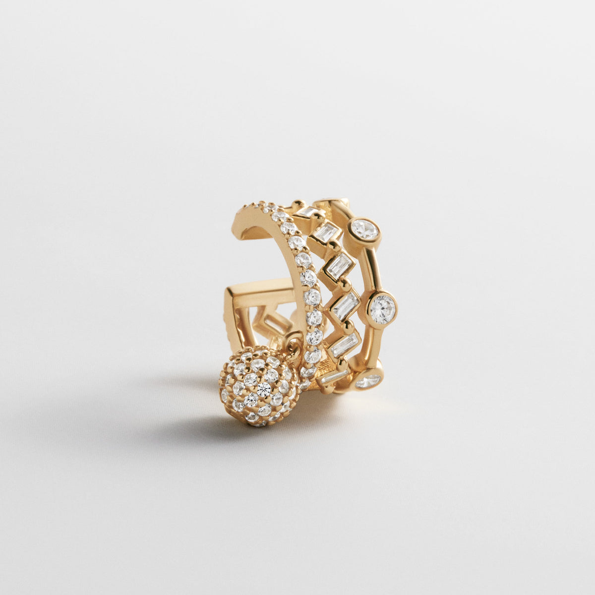 Lavisa piercing-free pavé gold ear cuff featuring a dangling charm