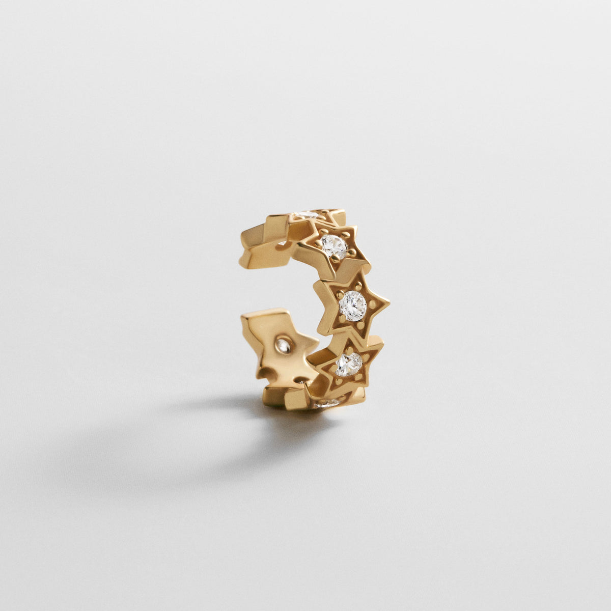 Lavisa 18K gold star ear cuff with sparkling pavé details for stacking