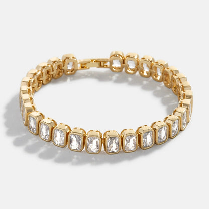 Lavisa emerald cut bezel crystal tennis bracelet shining on a display pad