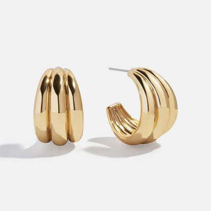 Lavisa gold hoop earrings with sculptural etched detailing for modern everyday style