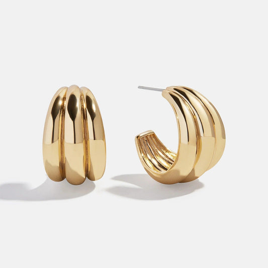 Lavisa gold hoop earrings with sculptural etched detailing for modern everyday style
