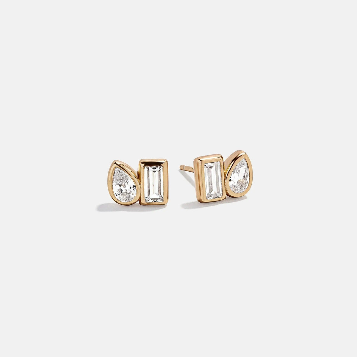 Lavisa 14K gold stud earrings featuring pear and rectangle cut crystals in a seamless design