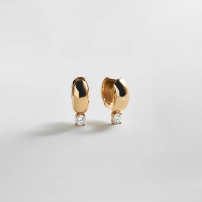 Lavisa Glossy Gold Huggie Earrings with Round Stone Accent