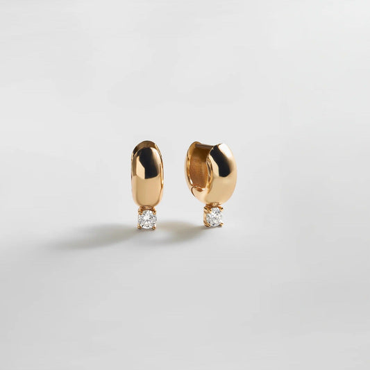 Lavisa Glossy Gold Huggie Earrings with Round Stone Accent