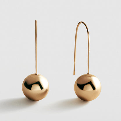 Lavisa gold drop earrings with bead station and fishhook closure