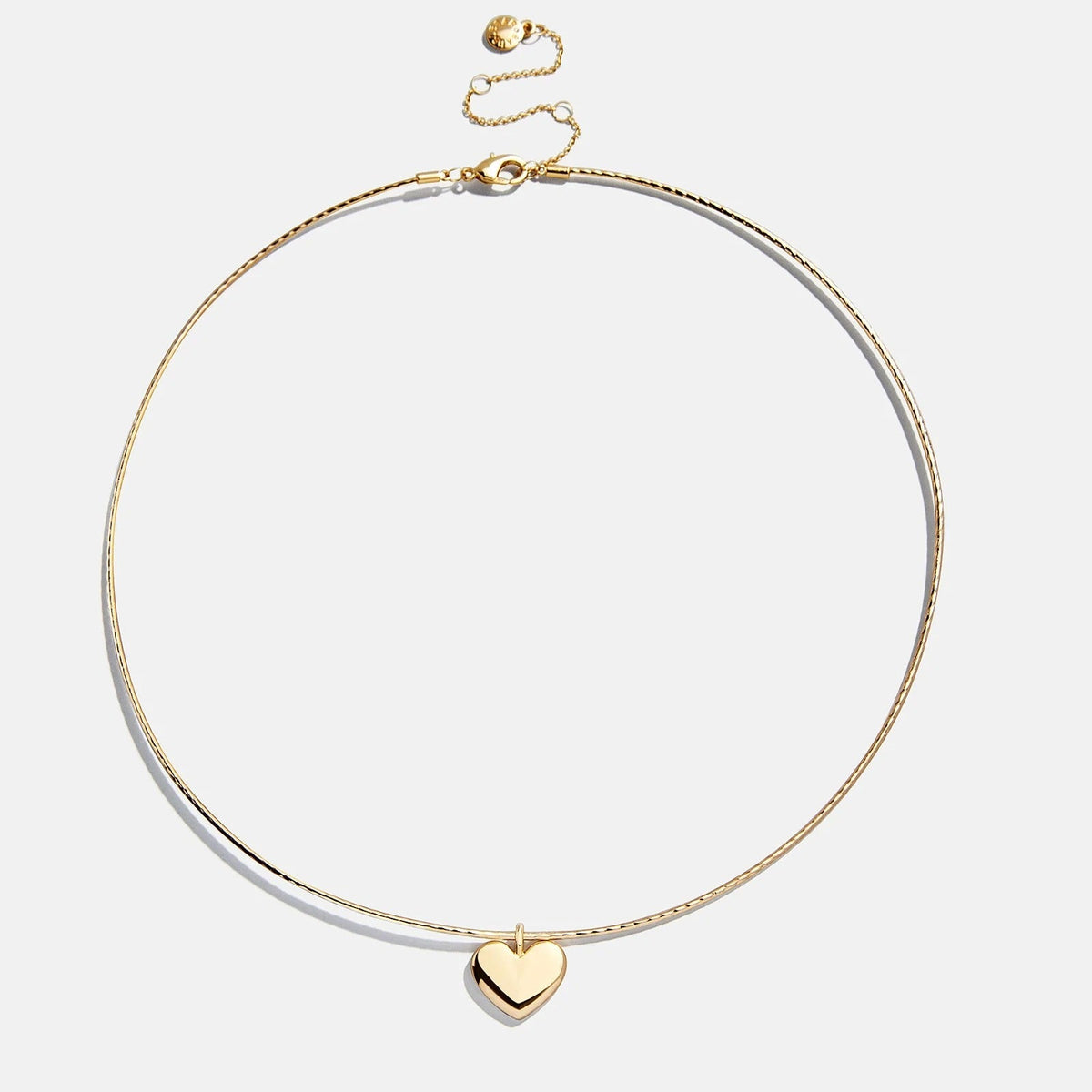 Lavisa Gold Heart Collar Necklace featuring a statement bubble heart charm on a structured wire base