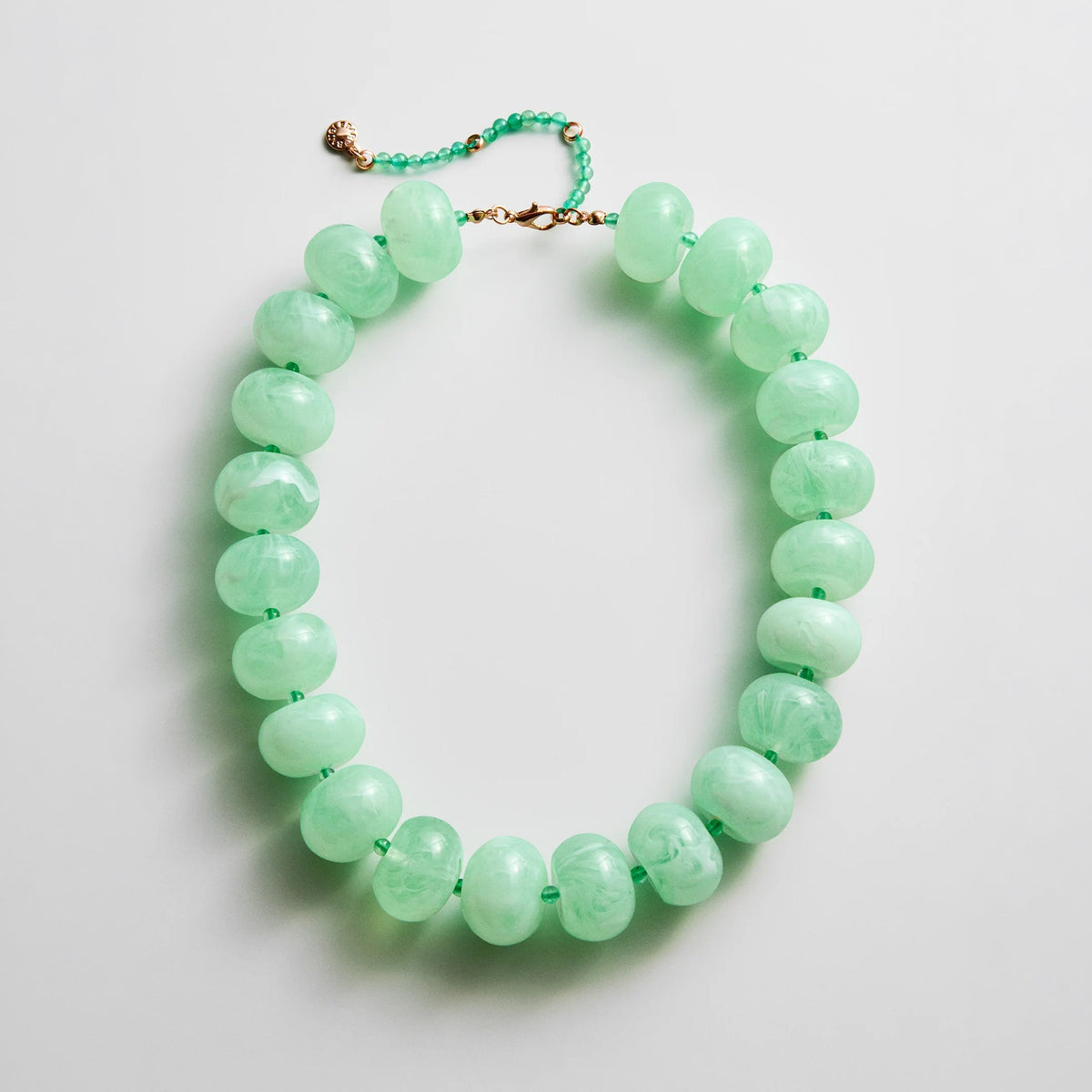 Lavisa semi-precious green jade beaded necklace displayed on a neutral background