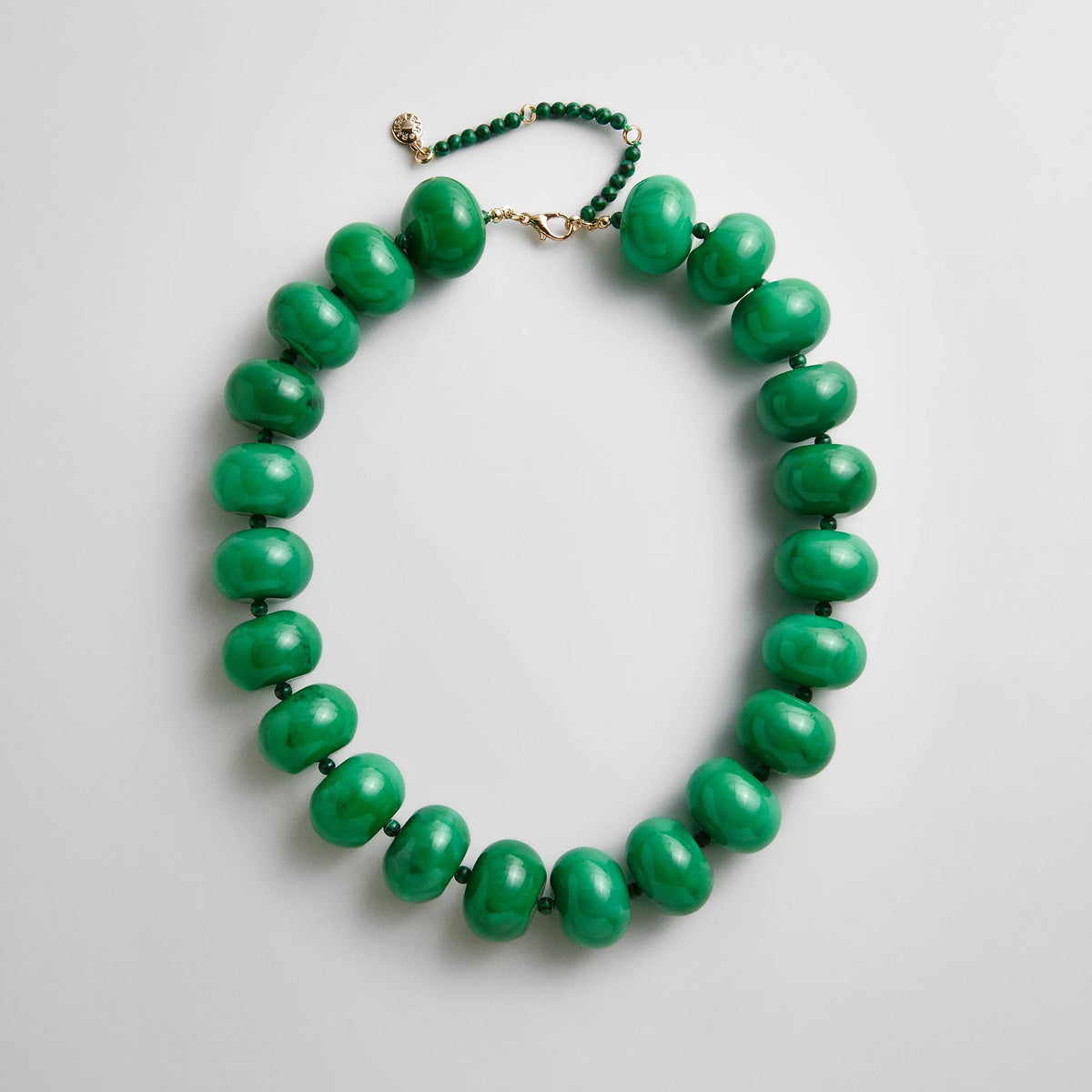 Lavisa malachite semi-precious beaded necklace with chunky green elements.