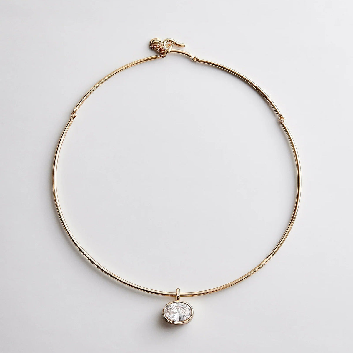 Lavisa gold wire crystal collar necklace on a neutral background
