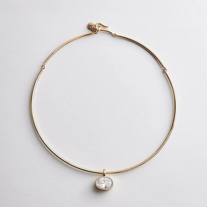 Lavisa gold wire crystal collar necklace on a neutral background