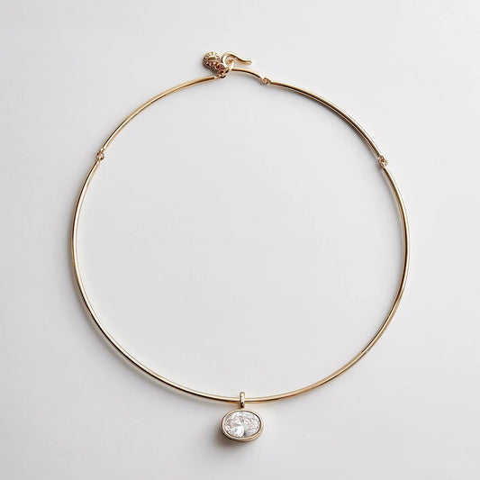 Lavisa gold wire crystal collar necklace on a neutral background