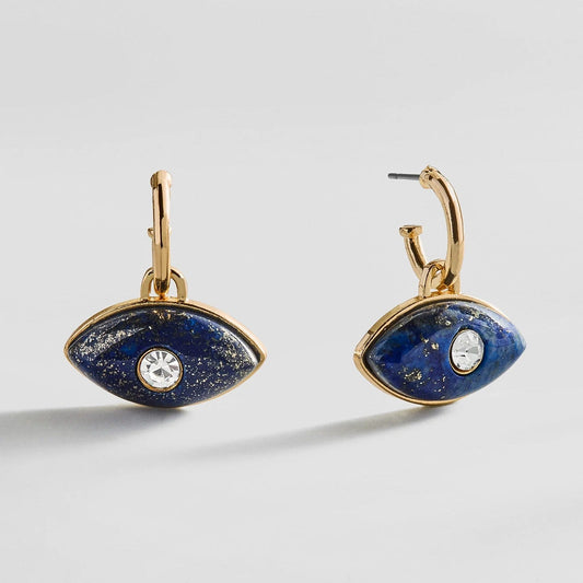 Lavisa Evil Eye Huggie Earrings in gold with blue sodalite charms