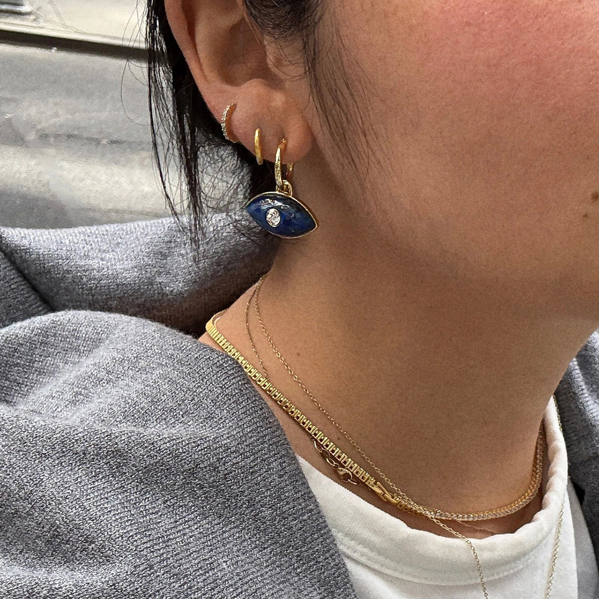 Lavisa - Semi-Precious Evil Eye Huggie Earrings - Detail & Styling View