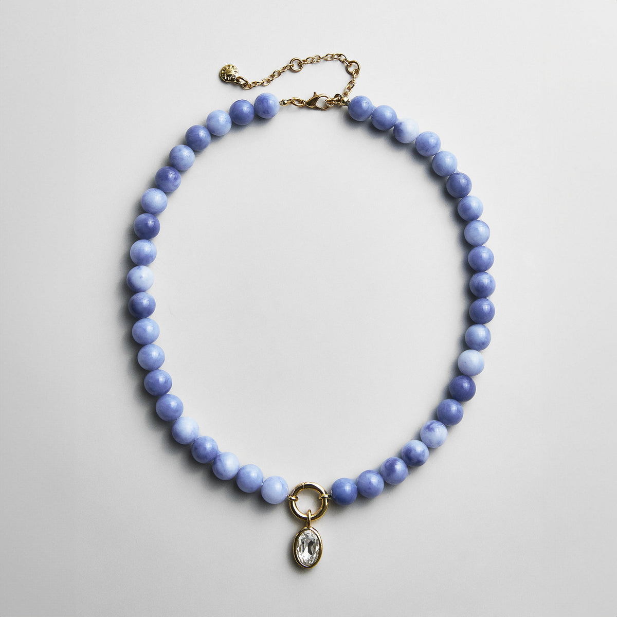 Lavisa Sodalite Beaded Ring Necklace with soft blue resin beads and crystal charm