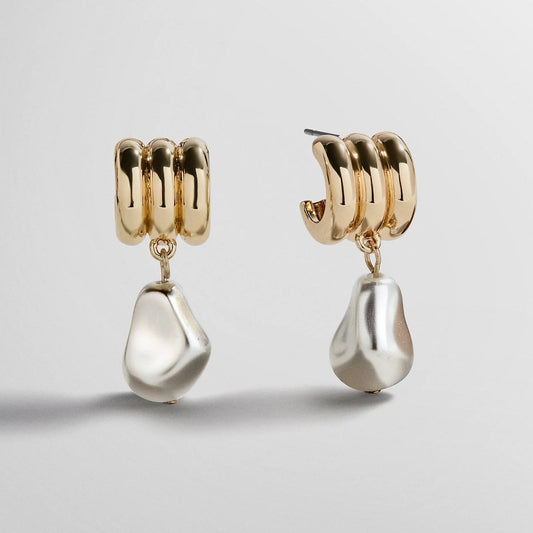 Lavisa Teagan baroque pearl earrings on a gold ribbed station