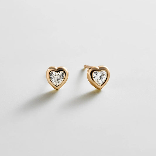 Lavisa Paloma 14K gold plated heart crystal stud earrings on white background