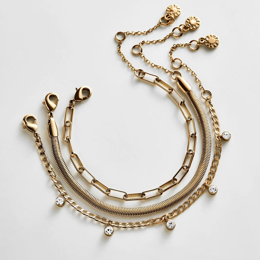 Lavisa waterproof stacking bracelet set featuring gold chains and stone details