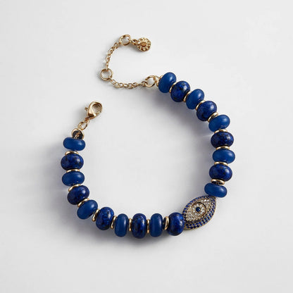 Lavisa Navy Evil Eye Semi-Precious Beaded Bracelet featuring deep blue lapis and gold beads