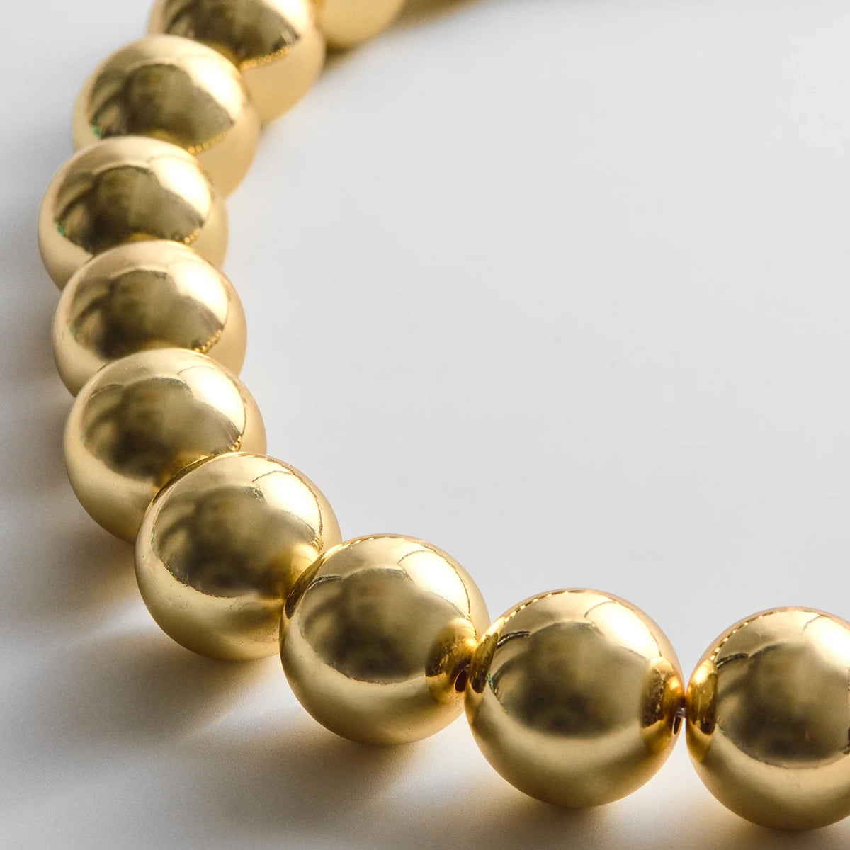 Lavisa - Chunky Gold Beaded Statement Necklace - On-Model & Scale View