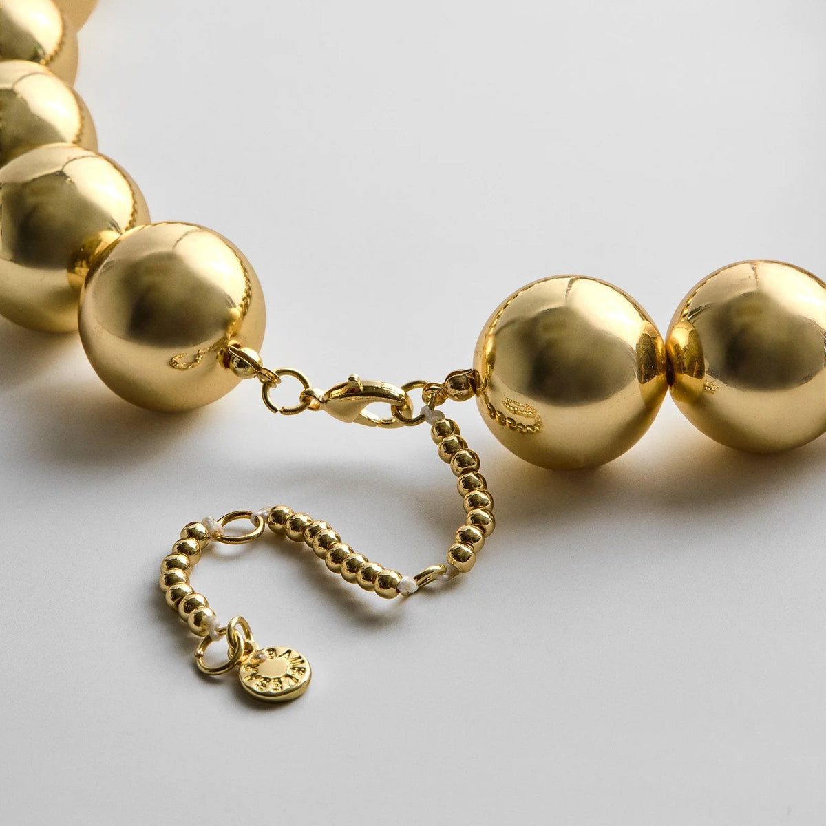 Lavisa - Chunky Gold Beaded Statement Necklace - Clasp & Finish View