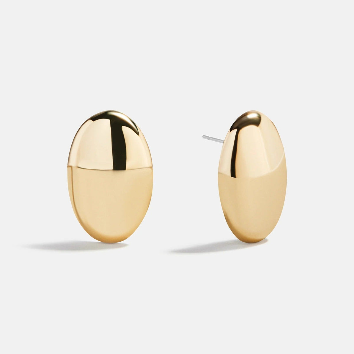 Lavisa Glossy Gold Domed Oval Stud Earrings on display
