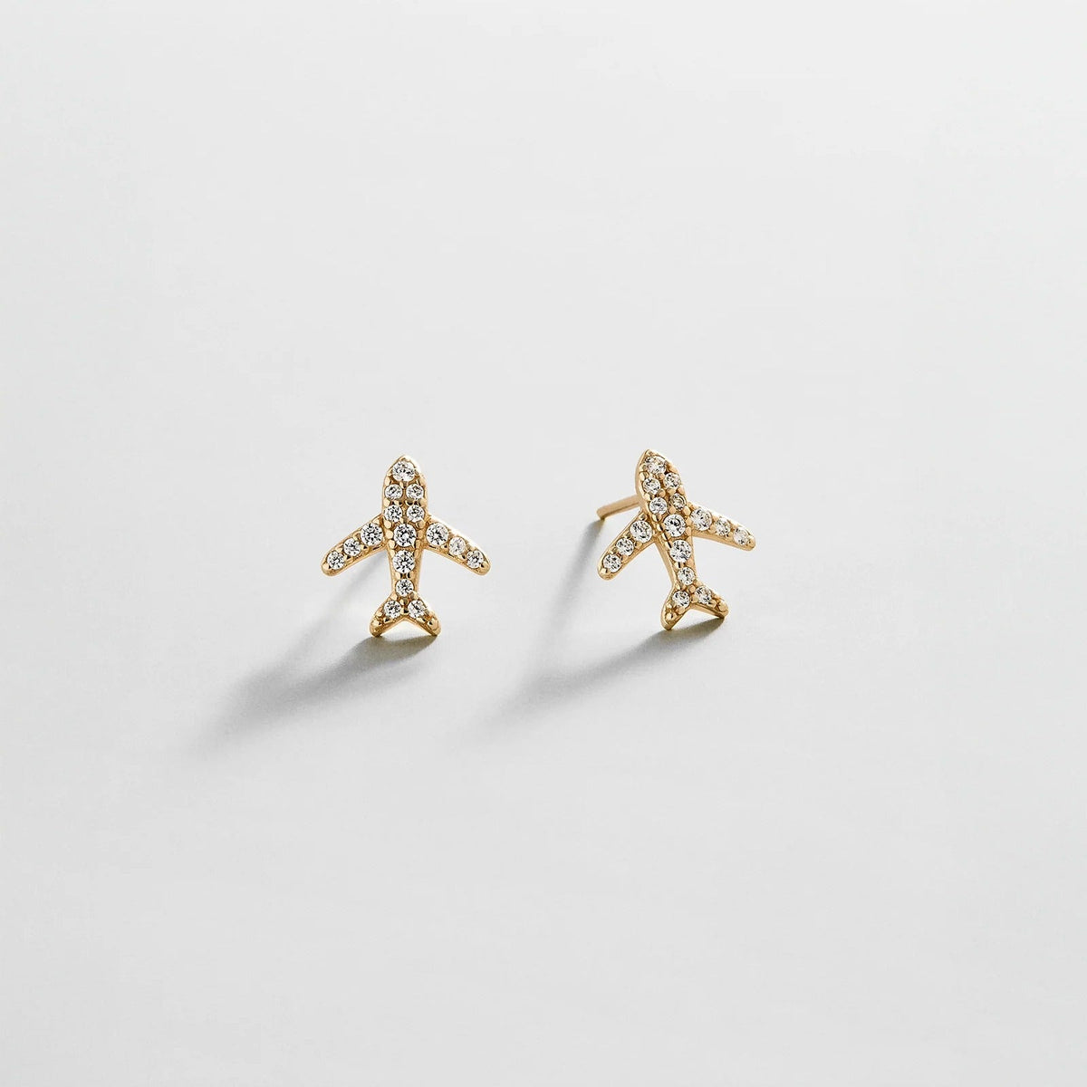 Lavisa Gold Airplane Stud Earrings with pavé crystal details